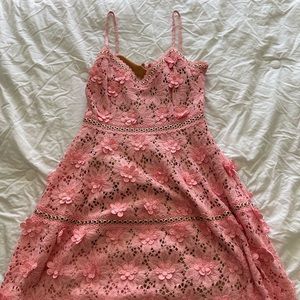 I am selling a beautiful floral piece from the Micheal Kors collection
